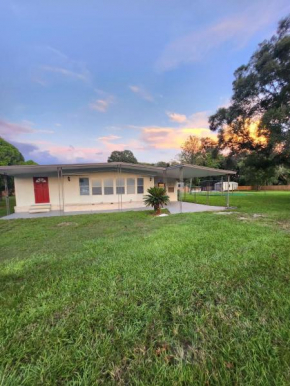 Country Home in the City with an Acre of Land